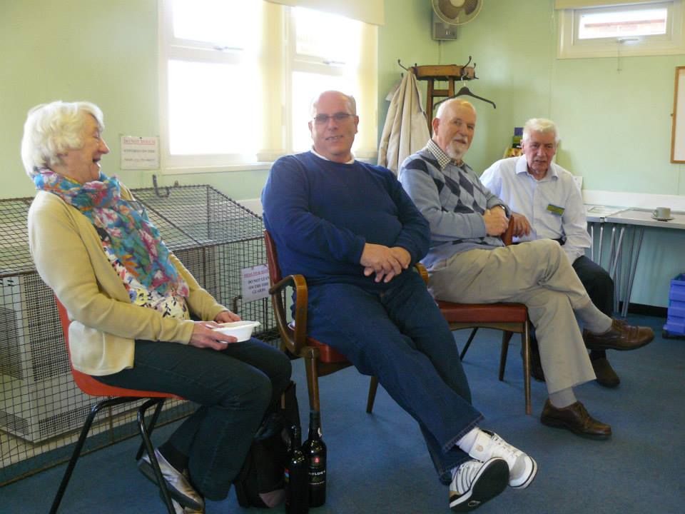 Group of people on chairs in support meeting