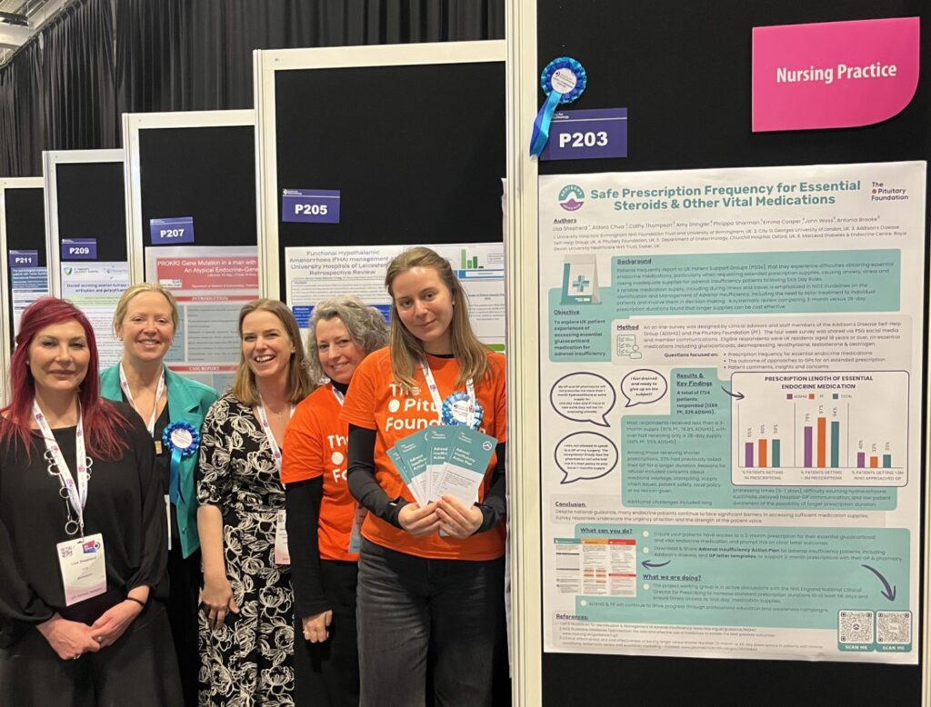 The PF and ADSHG teams stood next to the research poster at BES