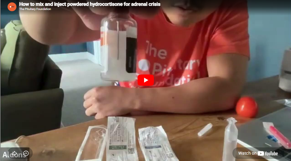 someone mixing the injection on camera