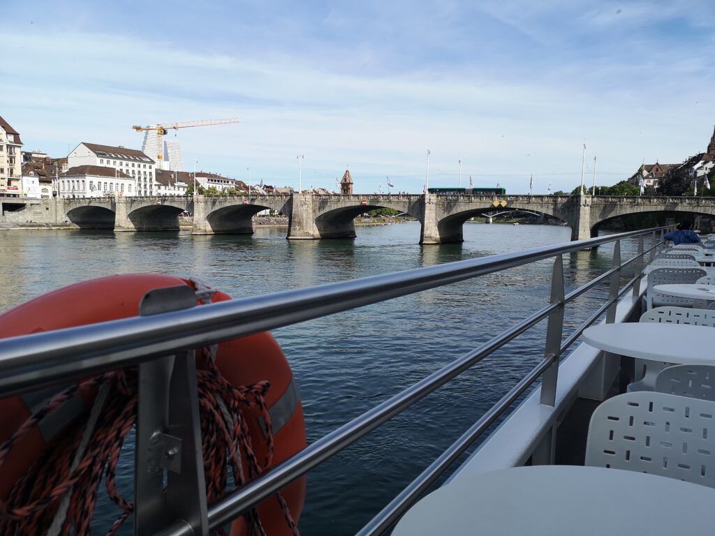 View of bridges and houses and blue sky from the cruise. 